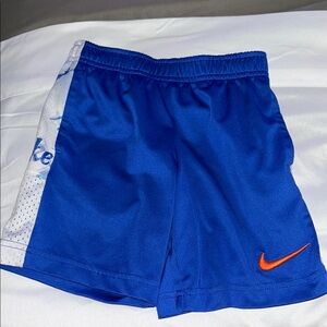 Nike Kids Royal Blue Shorts with Orange Swoosh